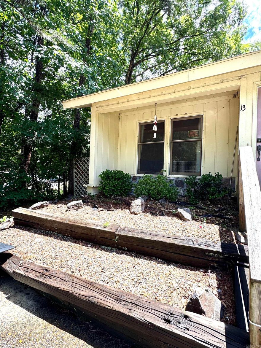 Fixer-Upper opportunity in the desirable Hot Springs Village community. This one-level, 3 bed, 2 full bath townhome is 1296 sq ft and located just 5 mins from the West gate. Flooring has already been removed everywhere except kitchen. Property is being sold as-is. First time HSV property owners are subject to one-time $2,000 buy-in fee to POA at closing. Are you ready to make this your next project?