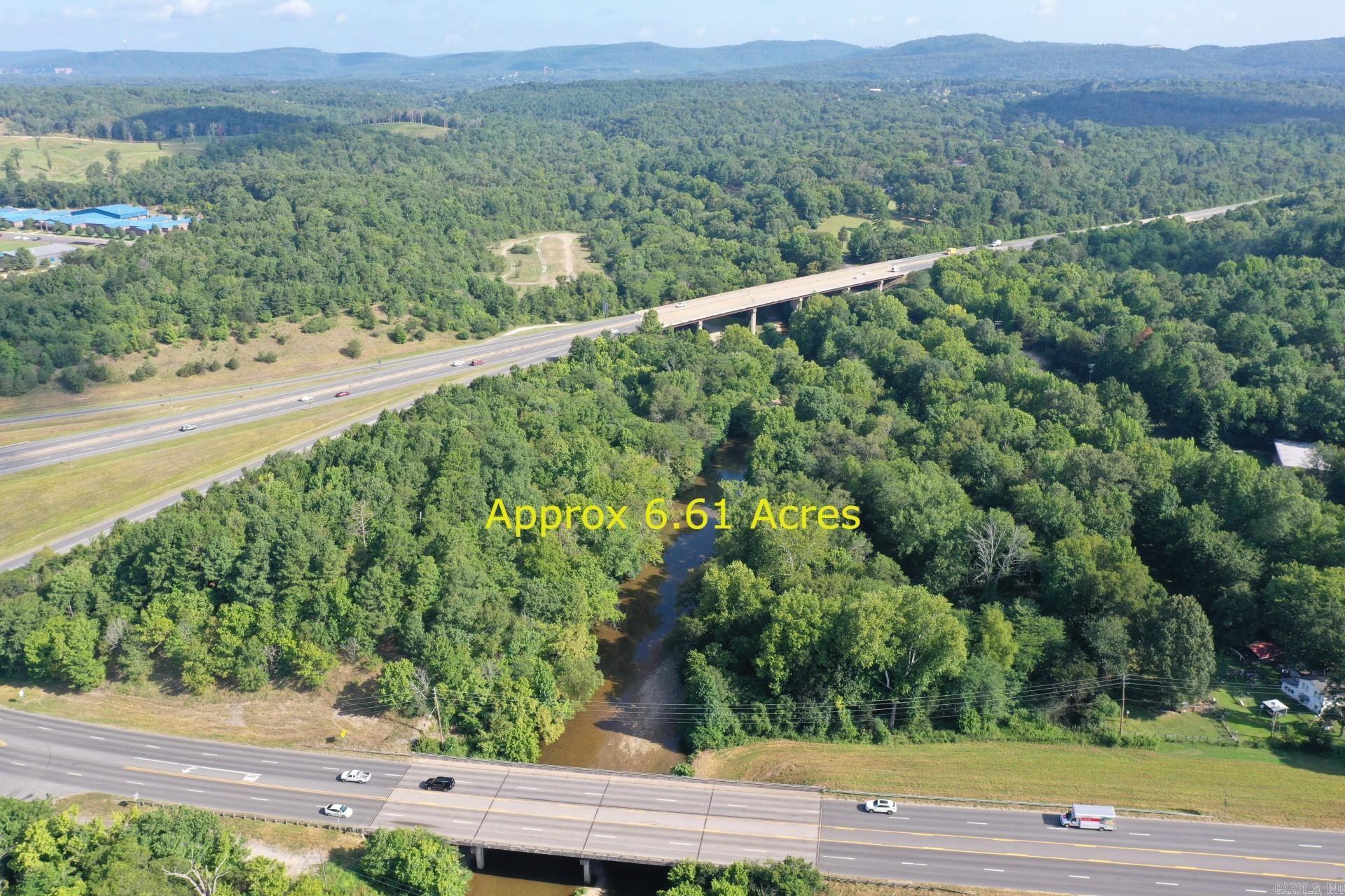 Take a look at the 6.61 Acres located on Malvern Ave/270 East. It is located beside MLK Bypass. This property could give great exposure and is close to all amenities. It even has a creek that runs through it. It is located less than a minute from Lakeside Schools, Shopping and Convenience Stores. High traffic area. Great price for this location.