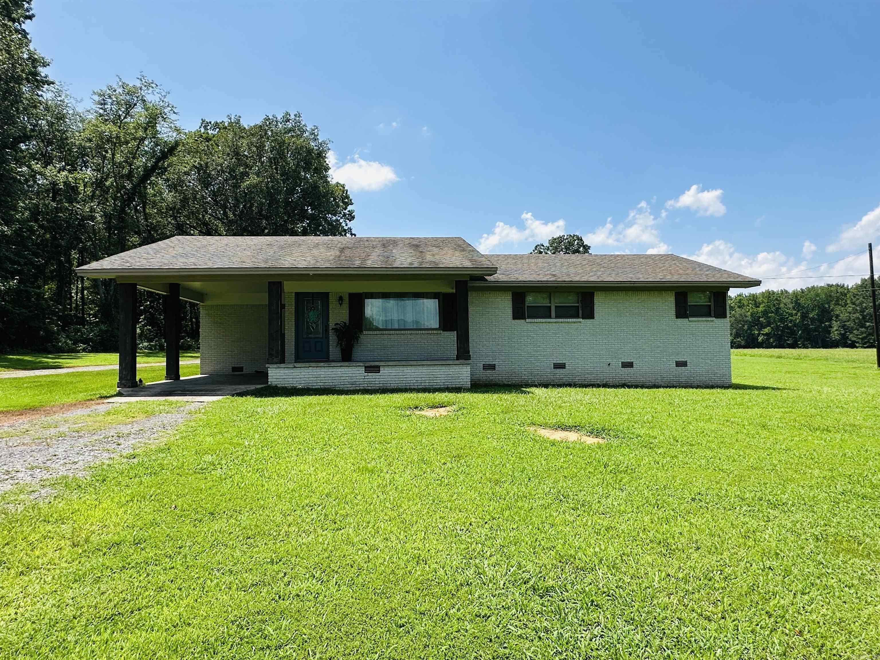 Welcome to your peaceful retreat! This beautifully updated 3-bedroom, 2-bath home sits on approximately 20 serene acres, offering the perfect blend of comfort and country living. Step inside to find luxury vinyl flooring, granite countertops, and a warm, inviting atmosphere that makes you feel right at home. Whether you're enjoying your morning coffee on the back porch or exploring your spacious property, this home offers the tranquility and space you've been searching for. Experience the perfect blend of modern updates and rural charm - your country dream home awaits!