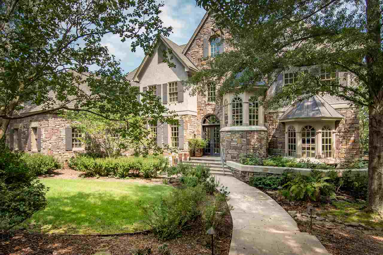 Architecturally designed, this stunning custom built home in gated Carmel is sited on .87 acres in the heart of west LR. Beautifully crafted windows, 10 ft ceilings, 9 ft made to order interior doors, site finished floors, & handsome paint finishes characterize this home. The European kitchen features a copper sink, Viking 5 burner gas range & double ovens, built in fridge. Hearth room w/huge windows looking out on a pool, patio & lush landscaping. Multiple outdoor living spaces. Elevator. Superb quality.