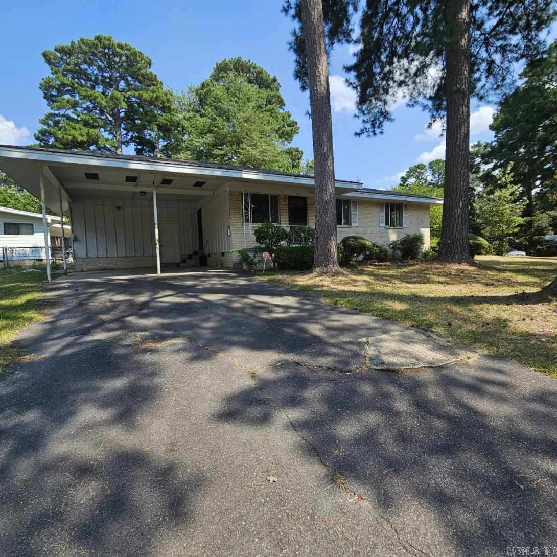 NEW PRICE $99,000. First time home buyer/ investor Special. It needs some TLC, large bedrooms, nice hardwoods, fenced yard, refrigerator to convey. Corner lot, covered patio, pretty private back yard. Attic storage Easy access to hospitals, hotels, shopping and the bus stop.