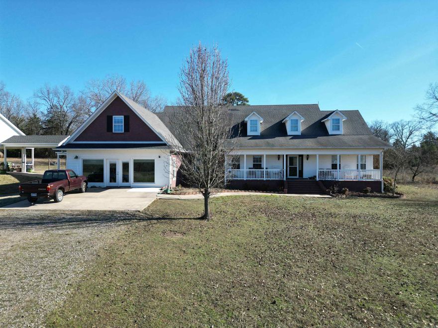 This stunning 3,930 sq. ft. home is nestled on 114 acres of pristine land in Cleveland, Arkansas, offering a rare combination of luxury and tranquility. The property includes three serene ponds, perfect for fishing, wildlife watching, or simply enjoying the peaceful surroundings. A spacious 30x50 shop provides ample storage or workspace for any project, while a 30x300-foot hay barn offers plenty of room for agricultural needs or additional storage. Inside the home, you'll find expansive living spaces with modern finishes and a thoughtful design that enhances the natural beauty of the landscape. Large windows throughout allow for panoramic views of the lush property, filling the home with natural light. The property offers a perfect retreat for those looking to enjoy privacy,