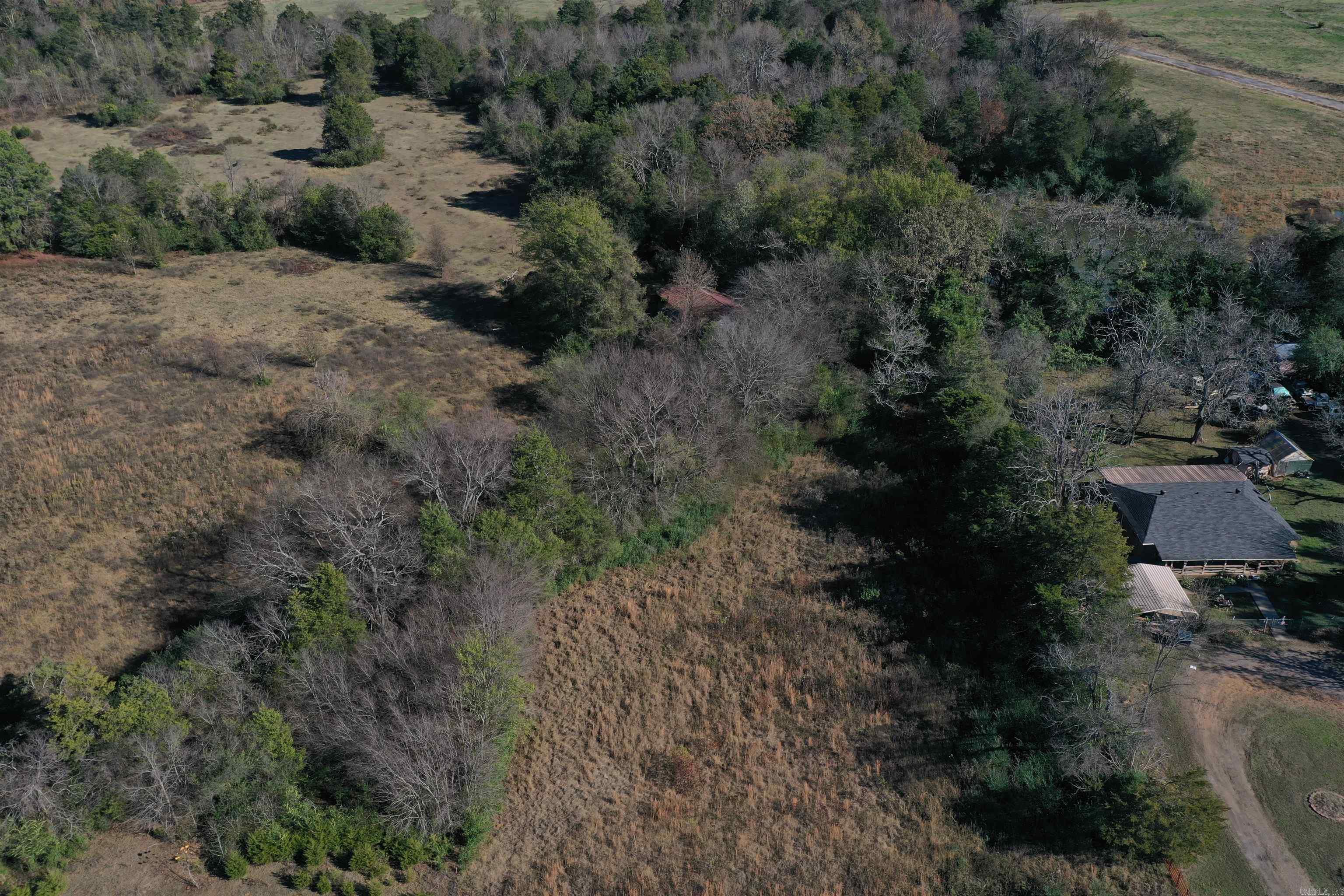 Located just north of the intersection of HWY 124 and Crow Mountain Road, sits this great build site! Totaling 4.18 +/- acres, and consisting of approximately half of an acre of pasture and the remaining balance in mature timber. The property has great access with frontage on highway 124, and is just minutes from both Russellville and Center Valley Schools. Utilities are available, and there are multiple build sites throughout the property. One of the best features of the property is the nearly half-acre pond that will be right outside your front door. There is an old barn on the property, and it is completely fenced as well. These tracts of land are hard to come by in this area. Call today to schedule your showing before itās gone! 4.18 +/- Acres ⢠HWY 124 Frontage ⢠Utilities available ⢠Completely Fenced ⢠Great Build site ⢠Mix of pasture and timber ⢠Large Pond ⢠Old Barn ⢠Minutes from Russellville ⢠Minutes from Center Valley Schools