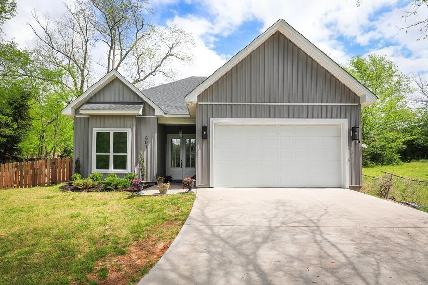 If you’ve been wanting to live near downtown Benton, this is it. Built in 2024, this 2 bed, 2 bath home offers 1,494 sq ft with an open concept layout, 10-foot ceilings, and modern finishes throughout. You’re welcomed by a clean, inviting entryway with double doors that bring in natural light and set the tone for the home.The living and kitchen areas feel bright and spacious with natural light from large windows and back doors overlooking the yard. The kitchen stands out with granite countertops, stainless appliances, ample cabinet space, a large pantry, and a layout that flows seamlessly into the main living area. The primary bedroom features a spacious bathroom with a tiled walk-in shower, dual vanity, and a large walk-in closet with built-ins. The guest bathroom is equally well finished with granite countertops and a clean, modern feel. The backyard is set up for enjoyment with a covered patio, above-ground pool, and a large yard with room to spread out. Just a short walk to local restaurants, shopping, and everything downtown Benton has to offer. A great starter home or a strong addition to your investment portfolio.