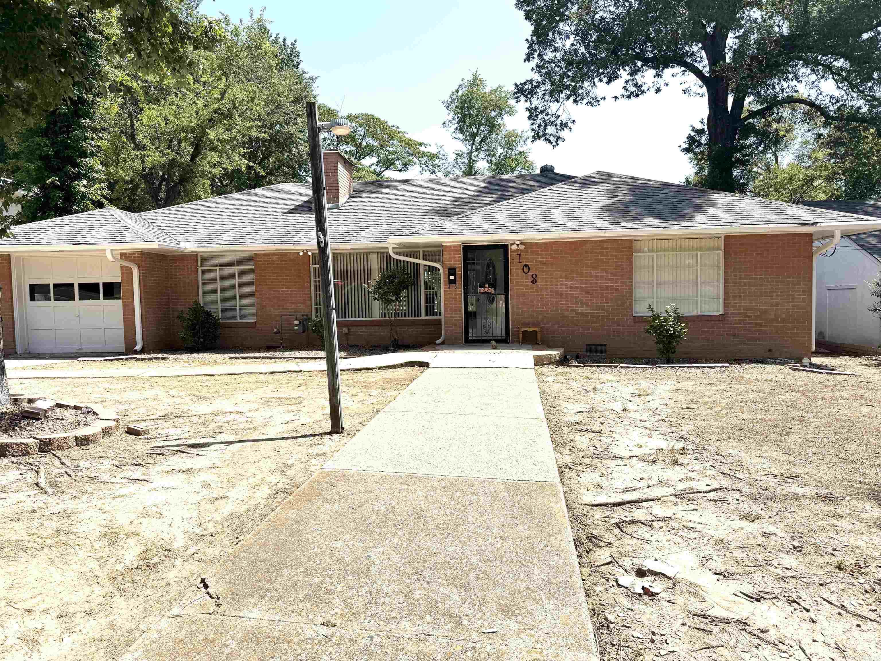 Come and see this lovely family home in the city with great potential!! All updated with new floors, new paint, new countertops and lighting!! Beautiful new floors in the living area really set off the fireplace nicely! You will love the back yard it is a master Gardeners dream!!! It has already been set up with many raised garden beds and trellises!! Has a nice small garden workshop also! This home is in the city close to grocery stores, shopping, doctors' offices and restaurants. Bus stop areas close and parks! Hurry to see this lovely affordable home!! No Sellers disclosure sold as is.