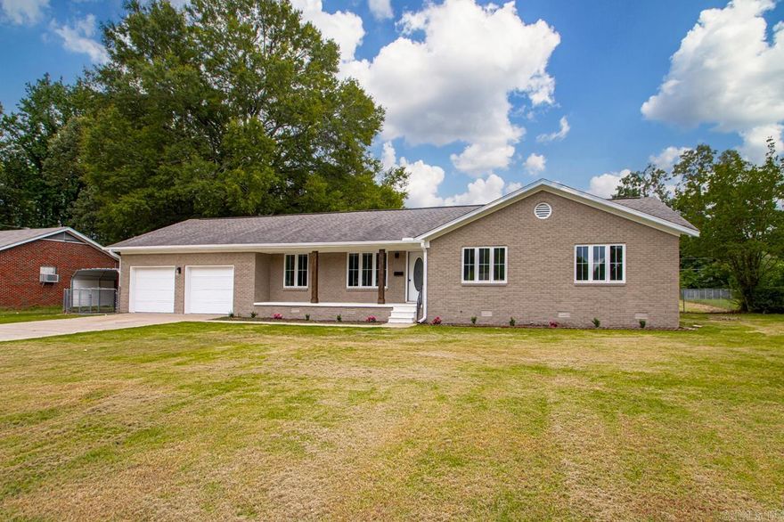 Fully remodeled 3 bed, 2 bath home with 1,785 sq ft of bright, modern living space! Enjoy brand-new cabinets, countertops, appliances, flooring, paint, light and plumbing fixtures — plus a 5-year-old roof. Features a large 2-car garage with extra storage, a huge fenced backyard, a spacious open deck, and a big shed perfect for projects or storage. Located in a quiet neighborhood with fishing lake access, just minutes from the interstate and great restaurants. This move-in-ready gem won’t last long — come see it today!
