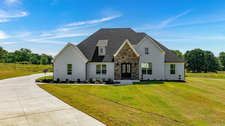 Experience luxury living in this stunning new construction home located in the prestigious Highland Hills subdivision. Boasting 4 bedrooms and 3 bathrooms, this home is the epitome of modern elegance. Step inside to discover custom cabinets, a gas cooktop, and granite countertops throughout the home. The cozy fireplace adds a touch of warmth and charm to the living space, perfect for relaxing evenings with loved ones. Enjoy the convenience of a tankless hot water heater and a covered back porch, ideal for outdoor entertaining and relaxation.  This home is designed for your comfort and convenience. Situated in a peaceful cul-de-sac, this property offers a tranquil retreat from the hustle and bustle of everyday life. Don't miss the opportunity to own this exquisite home in a highly sought-after neighborhood.