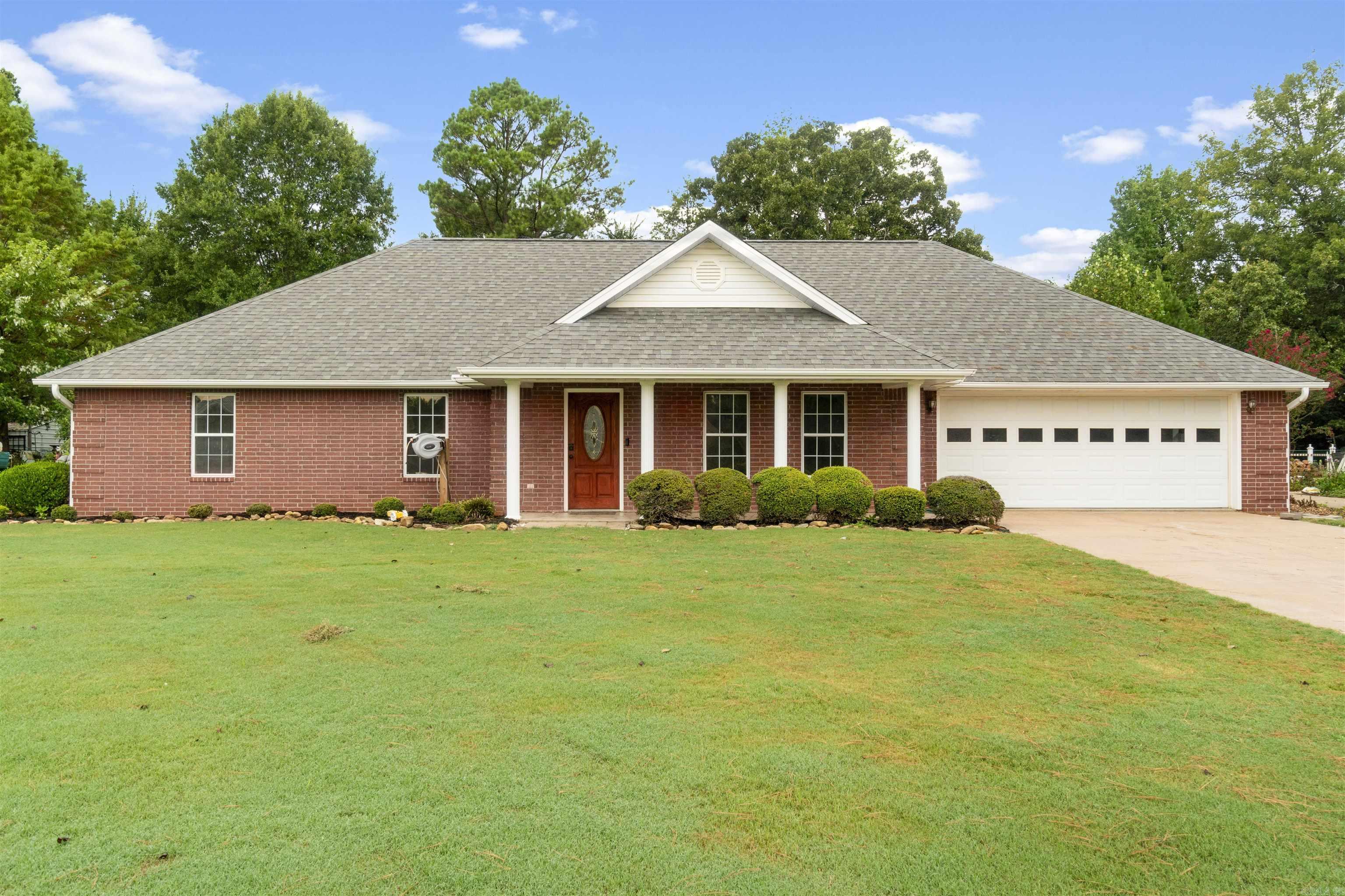 This well-maintained brick home sits at the end of a quiet neighborhood street and offers four bedrooms, two full baths, new flooring, fresh paint, and wide 36-inch doorways for full wheelchair accessibility. The layout includes a spacious master suite with a large walk-in closet, a big pantry, and a full-size laundry room. The garage is climate controlled, and a backup generator provides added peace of mind. Built in 2004 and owned by only its second owner, the home is in excellent condition with a beautifully kept yard, making it truly move-in ready.