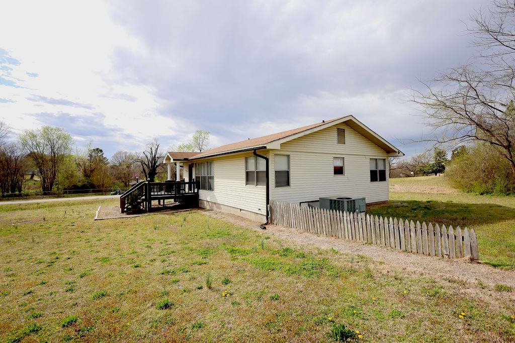 Immaculate, move-in ready, remodeled 3/1 with Hwy 62 frontage in Gassville. This home has amazing potential as a residential or commercial property. Cute as a button with lots of windows inviting natural light. Newly painted front and back decks, perfect for relaxing and entertaining. Plenty of yard space for pets or outdoor activity. Convenient to Mountain Home, Gassville, and Cotter, this home offers easy access to shopping, hospitals, restaurants, lakes, and rivers in a prime location!