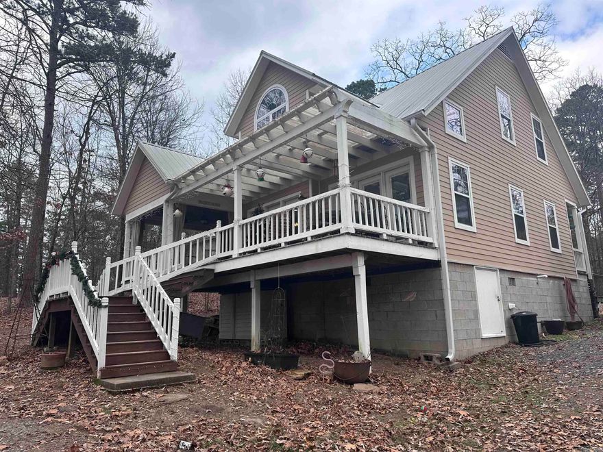 A stunning home inside and out with beautiful lake views. Built in 2010, this property features high-end finishes throughout, including hardwood floors, granite countertops, and a custom kitchen with an island and stainless-steel appliances. The custom bathrooms offer elegant walk-in showers and a relaxing whirlpool tub. The primary bedroom is conveniently located on the main level, with an open-concept kitchen and living area ideal for entertaining. Abundant storage is found throughout the home, along with a spacious 25x30 detached garage. Perfect as a full-time residence or a weekend retreat at Greers Ferry Lake, this home truly offers the best of both worlds. You’ll fall in love the moment you arrive.