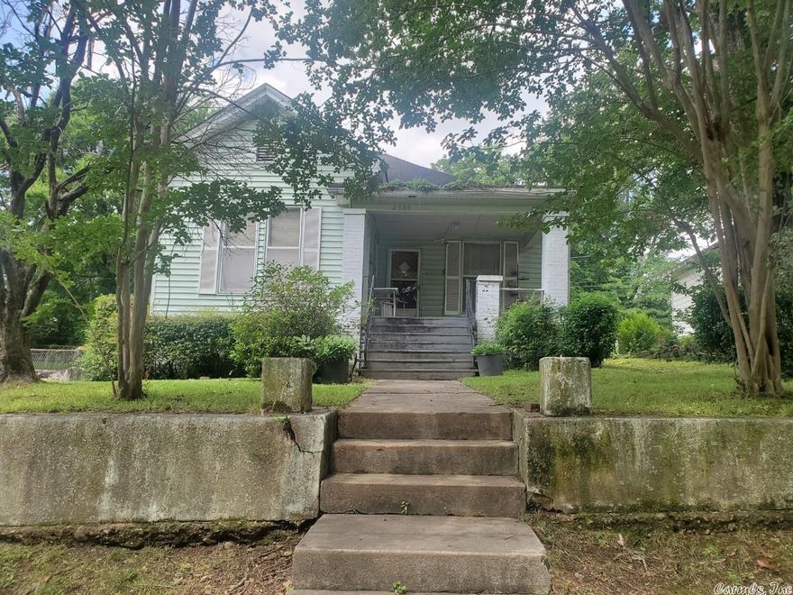 This is a large older home with two bedrooms downstairs, large kitchen and dining room. Also has two bedrooms and a bathroom upstairs. This home would be great for an investor or growing family----SOLD AS IS