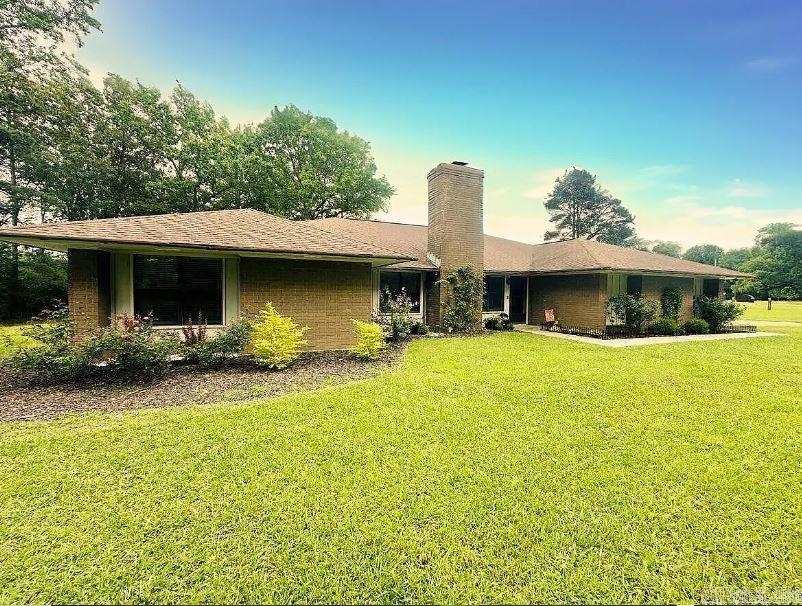 Welcome home to this beautifully updated 4-bedroom, 3-bathroom retreat set on 1.89 peaceful acres in the sought-after White Hall School District. Step inside and youāll be greeted by new hardwood floors, a soaring vaulted ceiling, and warm wood beam accents in the spacious living area. The kitchen offers both function and flow, featuring a breakfast bar and plenty of space for a full dining table. Just off the kitchen, the oversized primary suite (approx. 18x30!) is truly a sanctuary, with private patio access ideal for slow mornings or sunset evenings. The ensuite bath has been completely remodeled, bringing a touch of modern luxury to your everyday routine. With two HVAC systems and two water heaters, this home is designed for maximum comfort and efficiency year-round. Outside, youāll love the mostly cleared, shaded yard, perfect for play, gardening, or relaxing under the mature trees. Almost fully remodeled. Ask for the full list of updates! Donāt wait to tour this one! Itās the kind of property that feels like home the moment you walk in. Seller is offering $10,000 for Buyer's closing costs or rate buy-down!