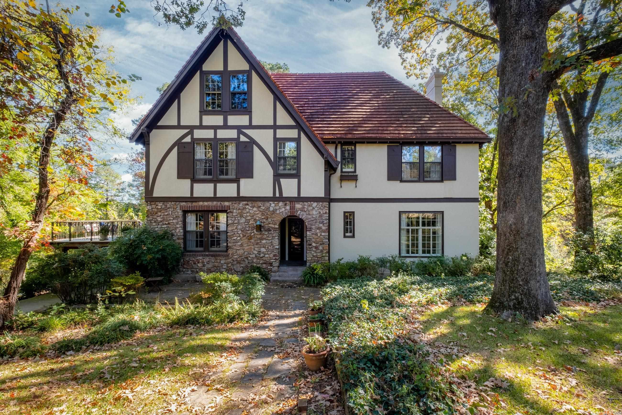 Remarkable historic residence with rare charm that sits on close to one acre. This spectacular property overlooking Allsopp Park is absolutely one of a kind. Gracious foyer with opening to formal living and dining areas. Large eat in kitchen adjacent to den. Primary suite and three additional bedrooms upstairs with private park views. Enormous attic could easily be transformed into additional living space. Beautiful outdoor areas for entertaining. Gorgeous lot with mature trees, terraced yard, decks, swimming pool, and tennis court. A Vintage gem!