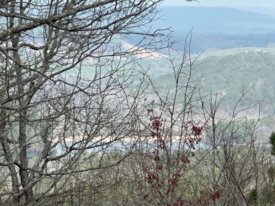 Beautiful panoramic mountain views and a view of Cortez Lake, this lot has it all.  Hot Springs Village is the largest gated community in the country with 26,000 acres, 11 lakes, 9 golf courses and miles of walking trails. New property owners are subject to a one-time POA buy in fee.