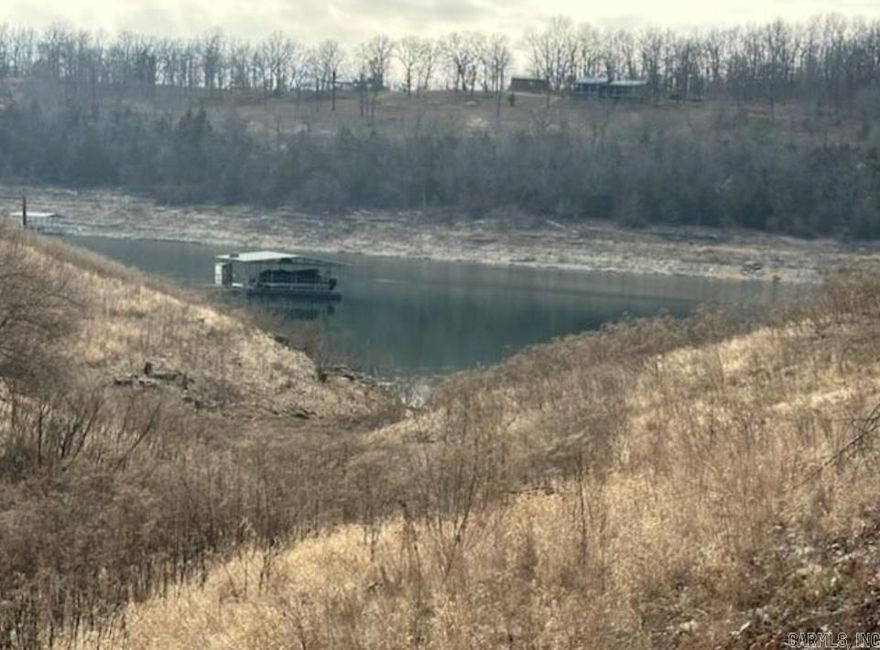 This beautiful 4.91 acres is ready for you to build your new home. It is right next to Dry Music Creek which is part of Big Music Creek. Great area for hunting, swimming, fishing and more of Arkansas' finest. Unrestricted!! Call or text for more information.