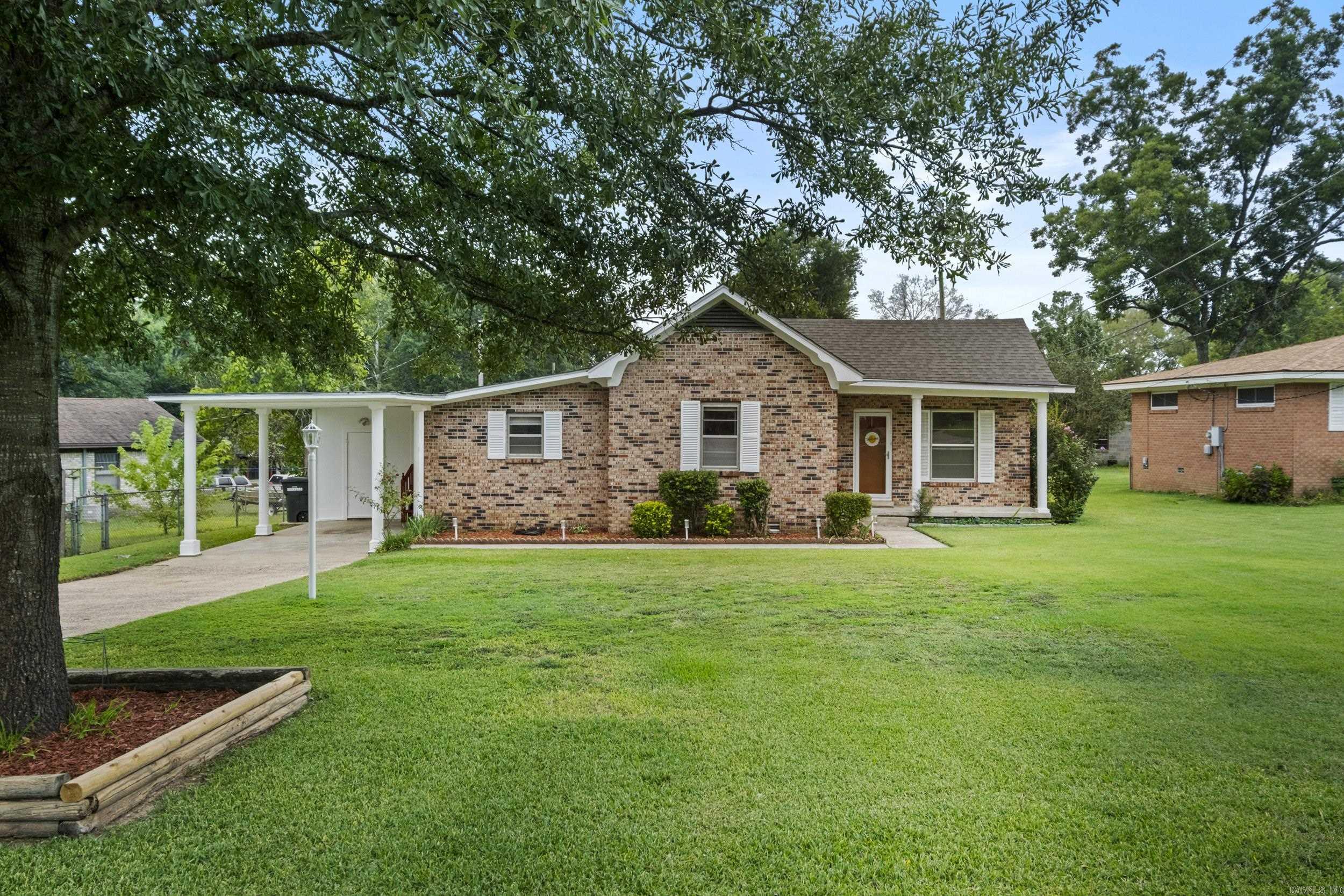 Welcome to this charming all-brick home in the heart of Sherwood! Offering 3 bedrooms/2 full baths, this property features 2 living areas, perfect for entertaining or relaxing. The kitchen and living spaces flow nicely, and a covered back patio provides an inviting spot to enjoy the outdoors. Additional highlights include a single carport with a parking pad for extra convenience. Major updates include a roof-1yr old along with AC unit and water heater that are only 4yrs old. Don't miss this well-maintained home in a fantastic location close to shopping, dining and schools!