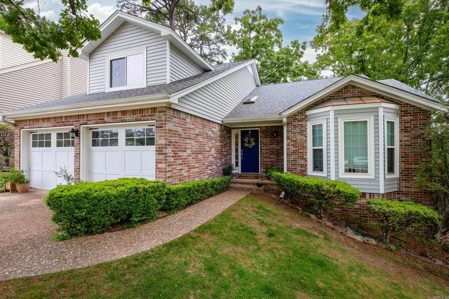 Welcome to 11 Cedar Branch Court — a charming two-story home that blends comfort, space, and convenience. This well-designed property features 3 bedrooms, 2.5 bathrooms, and a dedicated home office, offering flexibility for both everyday living and working from home. Vaulted ceilings create an open, airy feel, while charming built-ins add character and functional storage throughout.   Spacious walk-in closets provide ample storage, and the insulated garage doors add efficiency and year-round comfort.  Conveniently located close to shopping, restaurants, and everyday amenities, this home offers both tranquility and accessibility.