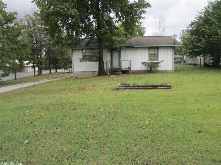 No. 01376   Location! Location! This cozy, 2 bed room, 1 bath home is within walking distance of the downtown court square in Mountain View, Arkansas. The single family dwelling has 864 square feet situated on a large corner lot. A detached, metal carport and sturdy, cement block storage shed complete this piece of real estate. This conveniently located property would make an excellent vacation or rental investment as well as an excellent starter or retirement home! In the center of town and reasonably pric