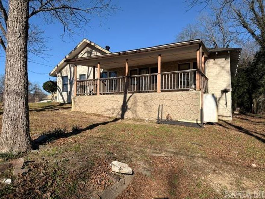 Adorable fixer upper on a wonderfully large, partially fenced yard. Window units and gas heat. Home being sold as is where is. No disclosure as seller has not occupied property in many years. Large deck, newer outside siding. hardwood floors. Needs roof and some interior work. Call listing agent today!