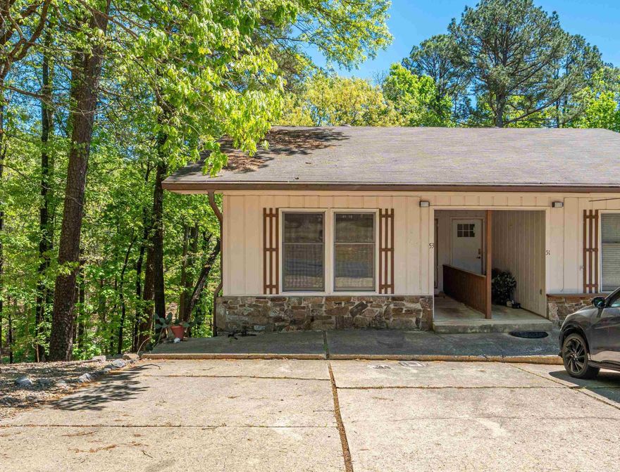 Updated end-unit townhome offering comfort, flexibility, and a peaceful wooded setting! This move-in ready 3-bedroom, 2 bath home features 1,402 sf across two levels, with a functional layout ideal for a variety of living situations.  The main level includes a spacious area that opens to a deck overlooking a private, wooded backyard-perfect for relaxing or entertaining. You'll also find a convenient main level bedroom and full bath, ideal for guest or single-level living needs. The lower level offers two additional bedrooms, a full bathroom and a laundry area, along with a versatile bonus room that can be used for storage, a hobby space, or flex room.  Enjoy added outdoor living with a second deck accessible from the lower-level bedroom.  Come and enjoy all that Hot Springs Village has to offer, including golf courses, lakes, tennis, pickleball, hiking trails and MORE!!! Call to see this great convenient home ready for you.