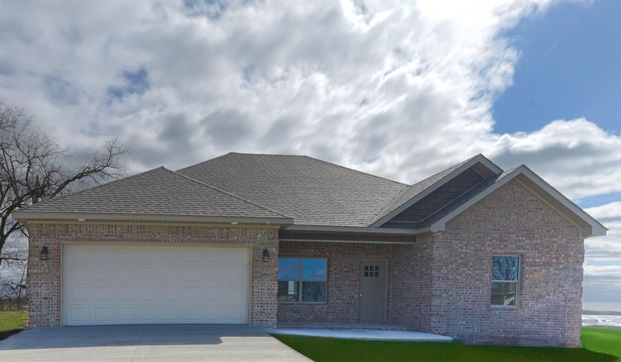 Welcome to Your Dream Home!  This stunning new construction offers modern comfort and timeless elegance in a highly sought-after neighborhood. Featuring 4 spacious bedrooms and 2 beautifully designed bathrooms, this home is perfect for families or anyone looking for extra space. Step inside to discover an open-concept floor plan filled with natural light. The kitchen is a showstopper with gorgeous countertops, sleek cabinetry, and modern appliances, making it a perfect space for cooking and entertaining.  Enjoy the convenience of a tankless water heater, ensuring endless hot water for your family, and a 2-car garage offering ample storage and parking space. Located in a great neighborhood, this home is close to schools, parks, shopping, and dining. Don't miss your chance to own this move-in-ready gem! Schedule your showing today! This home has been virtually staged!