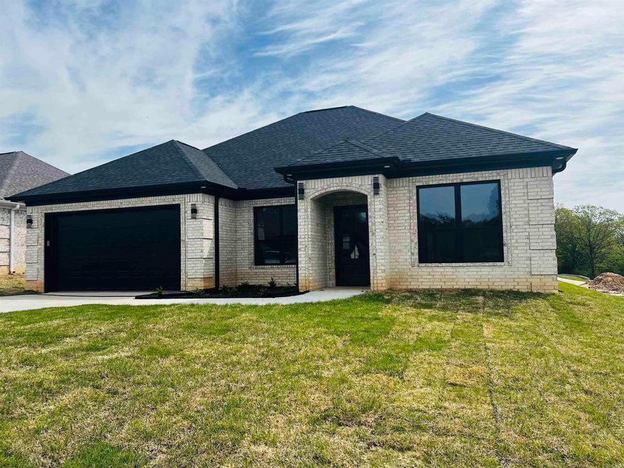 .Situated in a neighborhood in high demand, this stunning 3 bedroom, 2 bath home offers the perfect blend of style and serenity. The primary bedroom is positioned to provide a sense of separation from the guest bedrooms, ensuring a peaceful retreat. The kitchen is equipped with GE appliances, featuring sophisticated stainless steel packages, while the laundry room  showcases impressive Matte Porcelain Floor Tile. Additional highlights include a spacious  walk-in pantry, Quartz countertop work  island/breakfast bar, and expansive living  area that flows into the kitchen. The Open  Family Room is complete with an electric  fireplace and accent walls.  Perfect way  for  unwinding enjoying the wood-burning  fireplace on the covered back patio.  BUYER LOAN FELL OUT, no fault of Seller.