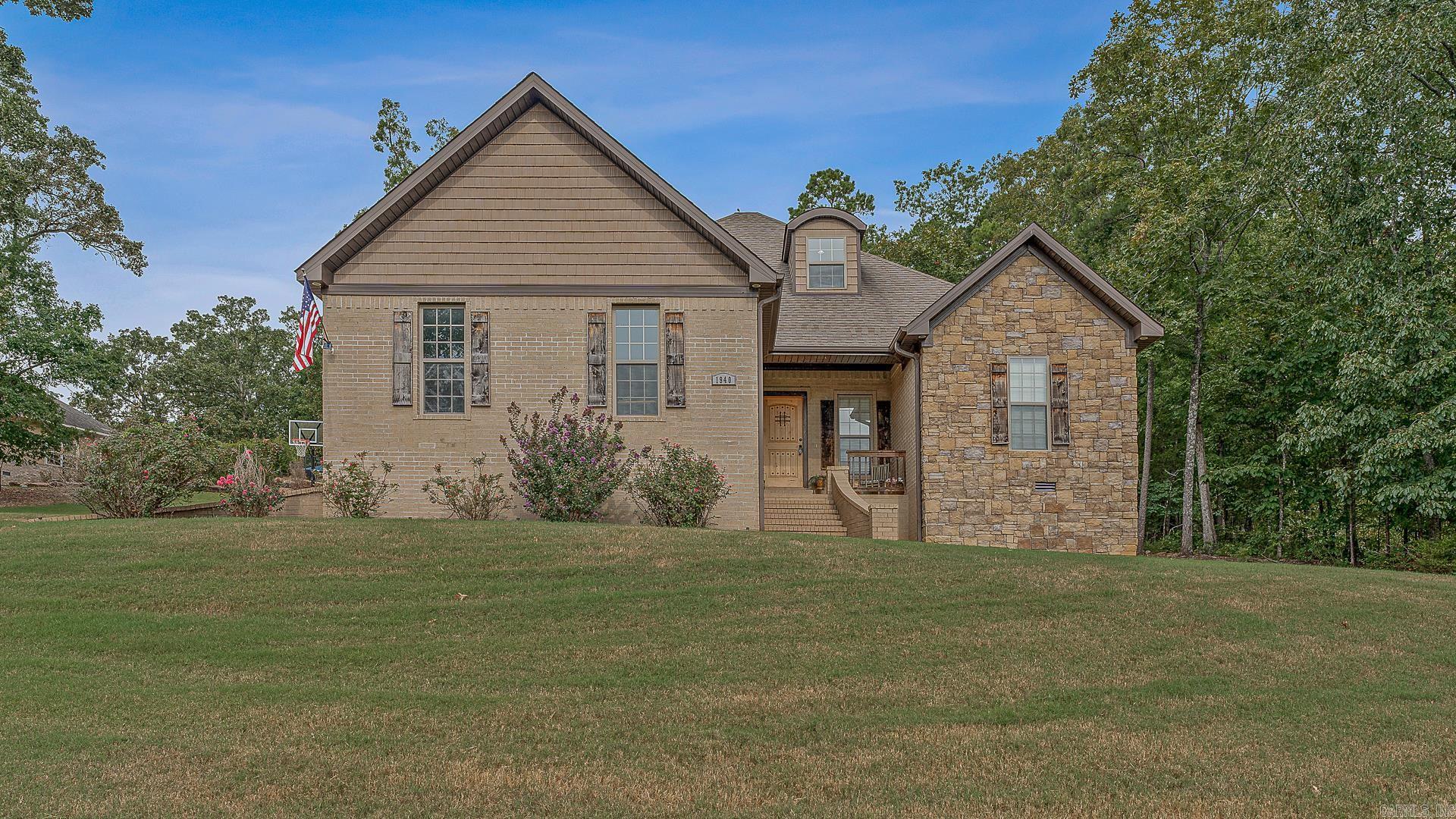 Discover refined living in this stunning 4-bedroom, 3-bath home nestled in the Mountain Ridge Subdivison, near The Course at Eagle Mountain! Built in 2014 and set on .68 acres, this ~2,366 sq ft residence blends modern comfort with timeless appeal. Step inside to find an inviting open layout with abundant natural light, hardwood floors, and a spacious living area perfect for entertaining. The kitchen features granite countertops, custom cabinetry, and stainless steel appliancesideal for any home chef. The primary suite offers a private retreat with a spa-like bathroom, double vanities, and a walk-in closet. Three additional bedrooms provide flexibility for family, guests, or a home office. Enjoy outdoor living on the covered patio overlooking the beautifully landscaped yard. The oversized lot offers room for play, gardening, or simply relaxing in peace. Located just minutes from schools, shopping, and dining, yet tucked away in a quiet setting, this property combines convenience and privacy. Don't miss your chance to call 1940 Mountain Ridge Rd your forever home schedule a private showing today!