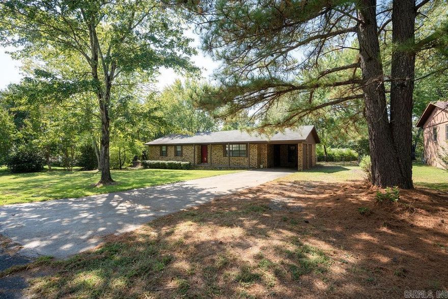 3 Bedroom 2 Bath Brick home in an ideal neighborhood ready for your own cosmetic updates. Walking distance to Thunderbird Country Club where members can enjoy golf and swimming. Public lake access to Greers Ferry Lake nearby. This home features an additional 480 sq ft of bonus space on the back consisting of two rooms climate controlled with windows units and gas wall heater, providing a total of 2039 square feet of usable living space. Fenced back yard with two outbuildings and covered patio.