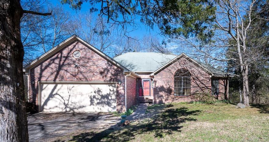 Nestled on 4.89 acres, this 4BR/2BA brick home enjoys a gorgeous view of large green space and amazing creek that runs the length of the property. Spacious greatroom (with WBFP) flows to kitchen and dining room with access to deck. Eat-in kitchen with granite counters, refrigerator that stays, and pass through to greatroom. Separate laundry room off kitchen with pantry. Master bedroom is spacious with walk-in closet and has access to deck overlooking large yard backing up to creek. Master bath with separate walk-in shower and jetted tub plus large windows overlooking back yard. 3 other bedrooms. Shop/Storage building with fenced area. 2 car garage.