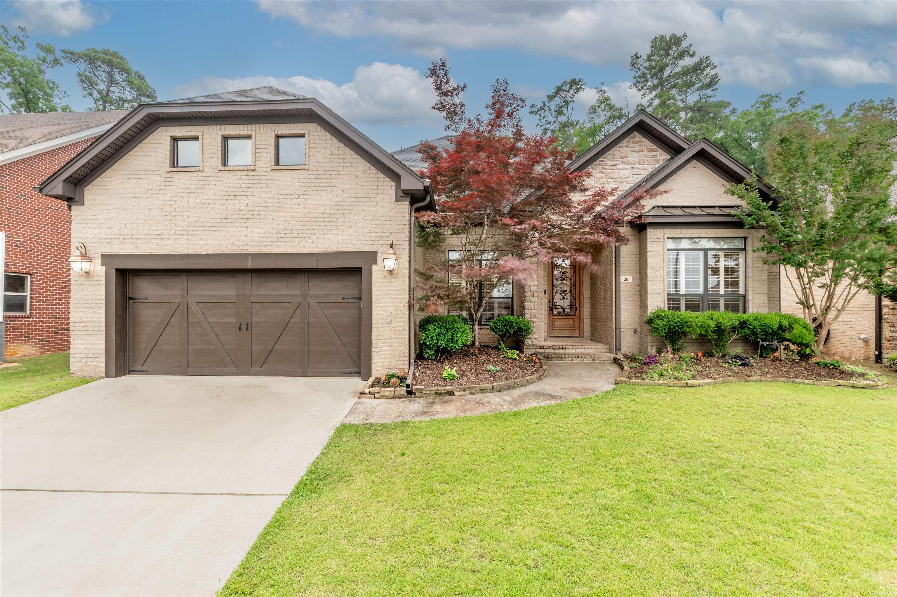 This well-maintained home offers comfort, style, and functionality in a single-level layout. With 2,099 square feet, it features four generously sized bedrooms, two full bathrooms, a half bath, and a separate office that provides flexibility for working from home or a quiet study space. The open-concept kitchen is complete with granite counters, a gas range, wall oven, and large pantry, seamlessly flowing into the main living and dining areas. Thoughtful design touches include hardwood flooring, crown molding, a gas fireplace, and walk-in closets. Outside, the flat, fenced backyard includes a covered patio and plenty of space for play or entertaining. The home also includes a two-car garage, floored attic storage, and updated systems for peace of mind. Located in Pulaski County Special School District with easy access to shopping, dining, and main roads.