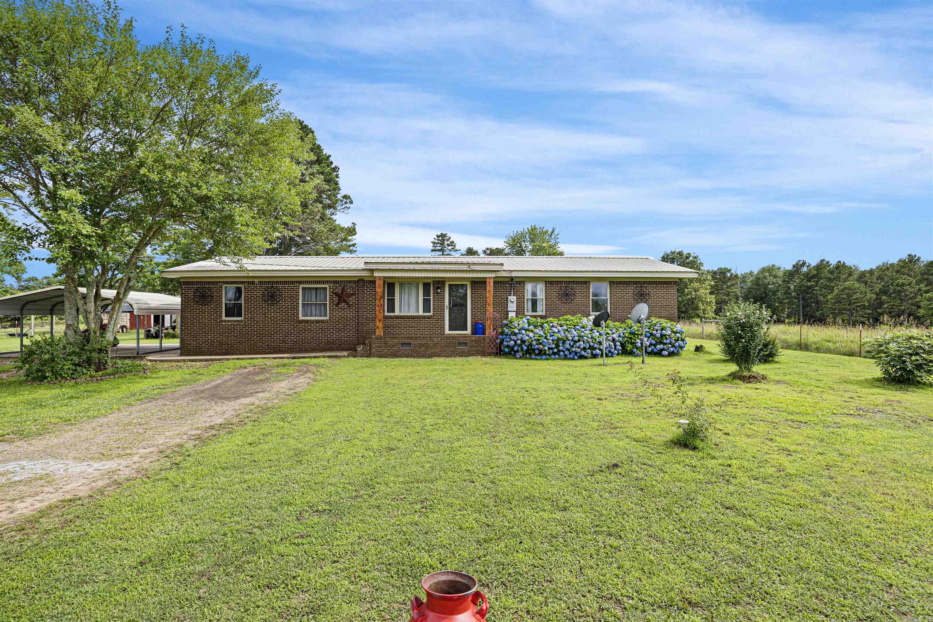 Residence and Hobby Farm on 10 Acres Looking for that perfect slice of the country life? This awesome 10-acre rural property is set up and ready for your hobby farm dreams! Whether itās cows, goats, or chickens, thereās plenty of space to graze and roam. The home features 4 bedrooms, including a converted garage that now serves as a large dining area and an extra bedroomāideal for guests or a home office. Youāll love the layout and the room to spread out. Outside, youāll find a barn, cross-fencing, an established garden, and multiple animal areas ready to go. Peaceful, private, and full of potentialāthis one is a must-see for anyone wanting to live the farm life without giving up comfort!