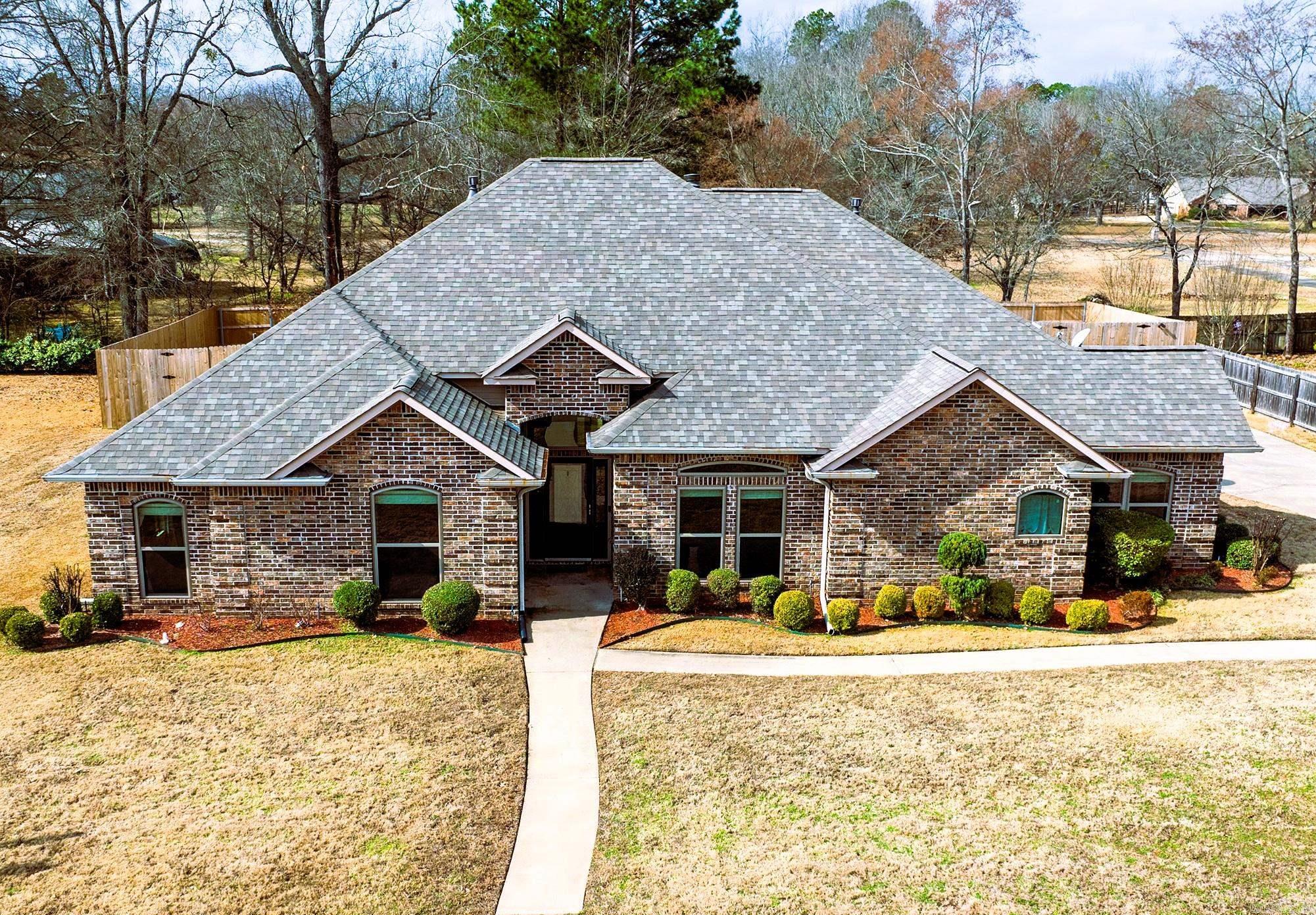 MOTIVATED SELLERS! Call this charming 4 Bedroom, 2 and half bath is an absolutely beautiful home yours. Nestled in a quiet and secluded neighborhood on the Arkansas side of Texarkana. Features included heated pool, new fencing, outside surveillance cameras and new energy efficient windows. Refrigerator, washer, dryer, and pool equipment all convey. Do not miss out on this home, it won't last long! Call today for your private showing! Again, sellers are very motivated to sell and all reasonable offers will be considered.
