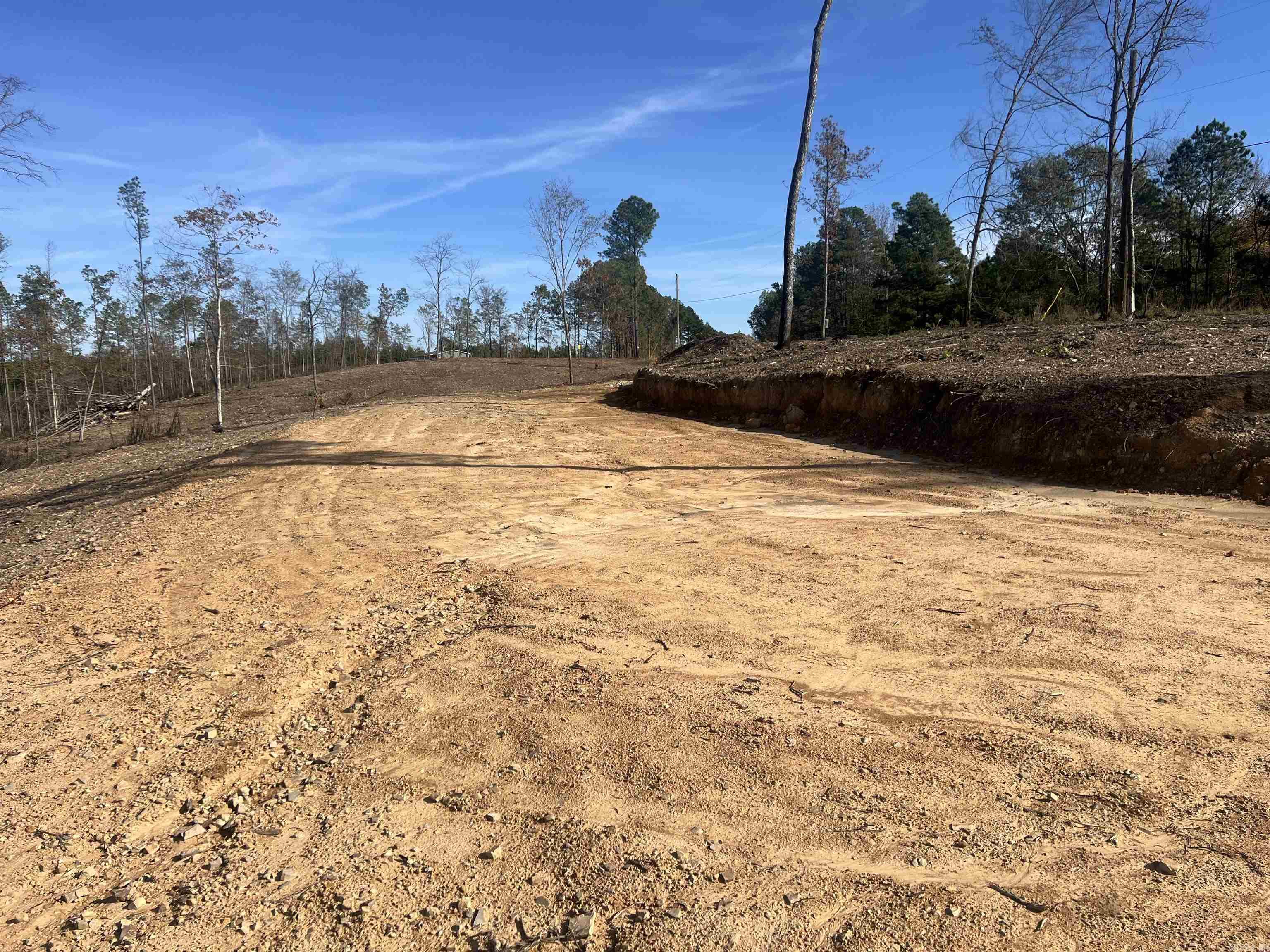 Beautiful Homesite Available! Partially cleared, ridge top views, Hwy 84 road frontage with utilities at the road. Lenox Marcus Recreation Area on Lake Degray is only a few miles away. Deed Restriction apply. Tract B