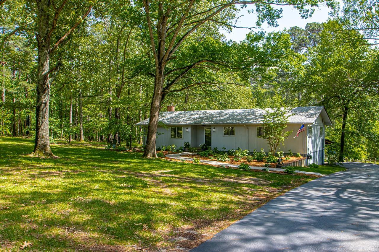 ***5 ACRES***NO RESTRICTIONS***POND** You will not want to miss this GEM. The owner has taken fantastic care of this property and done so many updates. New roof in 2021, New paint, New Flooring in some areas, New lighting, New landscaping, updated bathroom and many others. You will not want to miss out on this great property. There is a beautiful wood fence around most of the property and some areas not fenced. Pond is shared with neighbor. There is bass, crappy, and catfish. It has not been stocked in a while. Boat stays with property for pond and there is a small barn on the property. One car carport on backside of home. This home offers 3 bedrooms and 1 full bathroom. A formal dining room or could be used as an office. The kitchen has newer appliances (2023/2024). There is lots of storage in the this home. There is a small basement you access from inside the home for possible tornado safety or storage. Outside there is access to under the home. Some storage space there. This is an amazing property. Start your mini farm today!