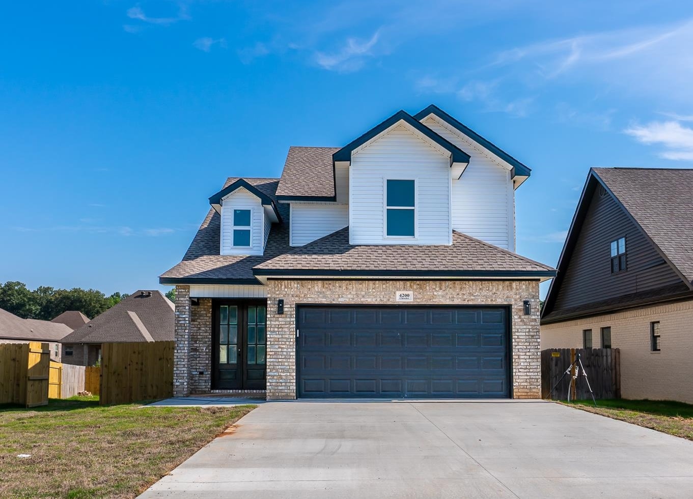 Welcome to 4200 Clowder Lane in Jonesboro, AR. Located conveniently near Hilltop! Beautifully designed new construction that is unique and modern. This home offers 2,000 Sq Ft with an spacious open concept on the main level. This unique layout offers more space for entertaining with a guest half bath on the main floor. The kitchen is equipped with beautiful Andromeda Quartz counter tops. The main bedroom and bathroom has a spacious walk-in closet with built-ins, a walk-in shower and a soaker tub. There are three bedrooms and two full bathrooms upstairs. The laundry room is conveniently on the second floor with all the bedrooms. Give me a call and let's go see it today!