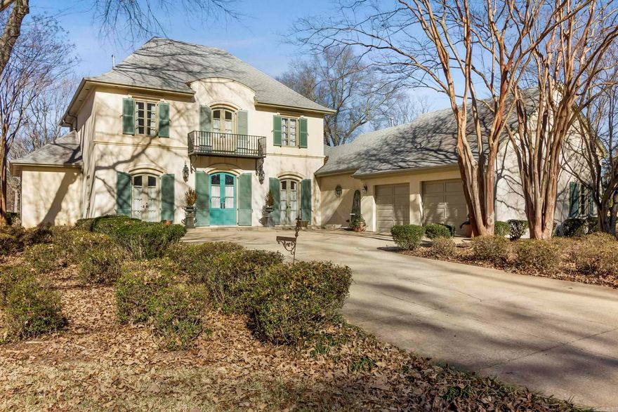 Elegant Country Club Living located on a large corner lot of the Searcy Country Club Golf Course. This exquisite custom-built French inspired residence offers a luxurious lifestyle in a highly sought-after location. Nestled on a sprawling 1.17-acre lot, this home boasts breathtaking views with 22 foot ceilings in the main living room and 10 foot ceilings throughout. This one of a kind home offers two living areas with hand built custom limestone fireplace in each of them.  Spacious rooms with soaring ceilings and an abundance of natural light. A large kitchen featuring Jenn-Aire appliances, ample counter space, and a large island. A large luxurious master suite offers retreat to an oasis of tranquility with a spa-like bathroom with his/her dressing areas, separate walk in closets and a door to the private retreat of a French cafe courtyard in the back yard. Enjoy the serenity of your own private oasis with a large, private courtyard for entertaining.  All wood doors,Marvin windows,and concrete stucco are added amenities.  This unique home features a large office and a large sitting room on the upstairs landing.