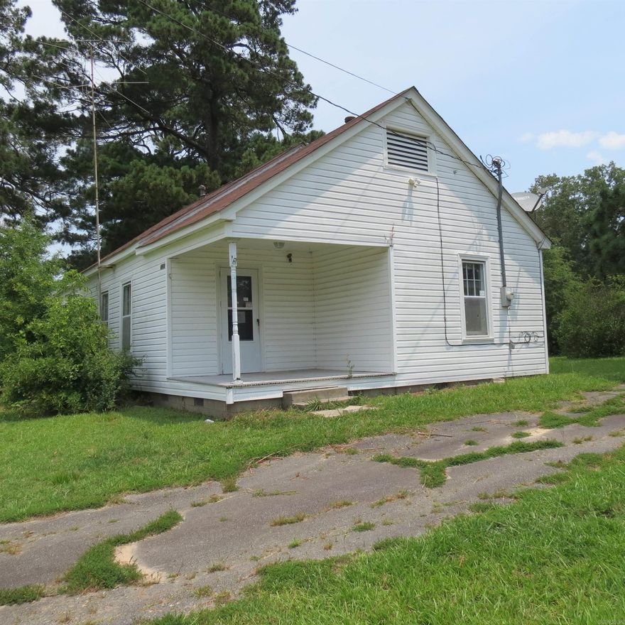 Great Investment property or Fixer Upper for your first home.  This cute home has 3 bedrooms and 1 bath on a large lot almost an acre.  It awaits your personal touches!! Two detached carports, two storage buildings.  Just off Sheridan Road, close to the I530 bypass.  Taxes are before Homestead Credit.  Call me today to see this home before it is gone. **Agents See Remarks**