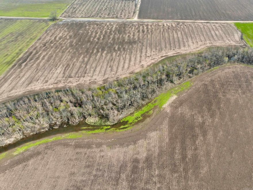 Once-in-a-Lifetime River Valley Investment Opportunity  Discover the true essence of the American Dream with this remarkable property located in the heart of the River Valley. Offering both income potential and exceptional recreation, this land is as versatile as it is beautiful.  The property features rich, tillable acreage ideal for row crop production, supported by fertile soil and ample water resources. Its proximity to Alma and easy access to I-40 make it an excellent choice for agricultural operations and those seeking to meet the growing demand for locally sourced, sustainable food.  For the outdoor enthusiast, the land is equally impressive. Crooked Slough runs directly through the property, providing prime habitat for deer, duck, and other wildlife. With Frog Bayou Wildlife Management Area and the Arkansas River nearby, world-class hunting and recreation opportunities are right at your doorstep.  With multiple access points, unbeatable location, and endless possibilities, this property is a rare chance to invest in a legacy piece of land.