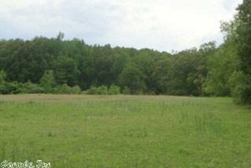 Beautiful rolling acreage/pastureland in the Bono area!  This 9-acre property has a 30x30 barn w/loft, 1 acre m/l "lockup" with chainlink fence and gravel (used to be cell tower enclosure), 2-acre stocked pond and storage shed w/concrete floor.  Perfect for building or horses!  There is a 60' easement leading to property on one side and a 30' easement on other side. Note:  Property will need a well and septic.  Drive by today to check this one out!!