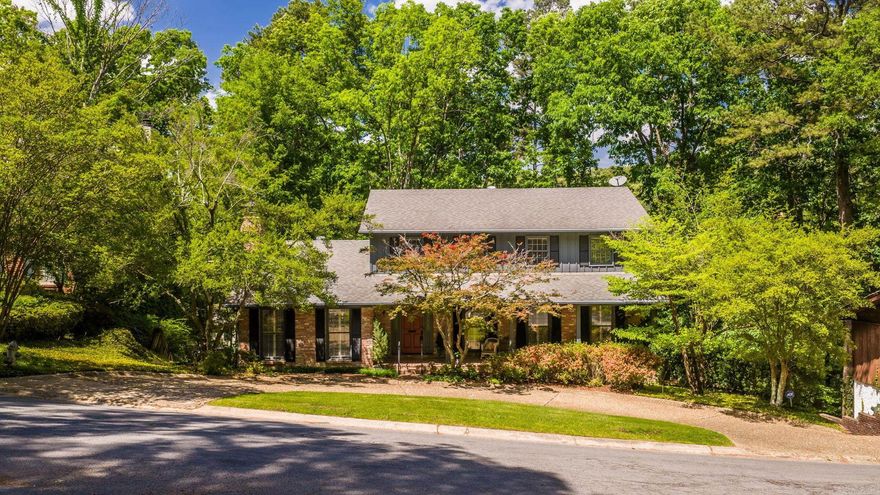 Wonderfully maintained traditional home in desirable Foxcroft, tucked away on a beautifully wooded lot. The main level offers excellent living space, including a cozy den/family room with gas-log fireplace, hardwood floors, plantation shutters, and an open flow to the breakfast room. A formal living room with hardwood floors and plantation shutters connects seamlessly to the formal dining room, which overlooks the serene, natural backyard. The kitchen features white cabinetry, tile countertops, a pantry, and is conveniently located next to the laundry room. A half bath completes the main level. Upstairs, the primary suite includes an updated bathroom with granite countertops, a walk-in shower with decorative tile surround, and a walk-in closet. Two additional bedrooms share an updated hall bath with granite countertops and a modern shower. The lower level offers a flexible bonus room, bedroom or office space with a full bath on suite. See agent remarks for a full list of improvements. Breakfast room chandelier does not convey. Enjoy the close proximity to the Little Rock Raquet Club. This lovingly cared for home is a must see!