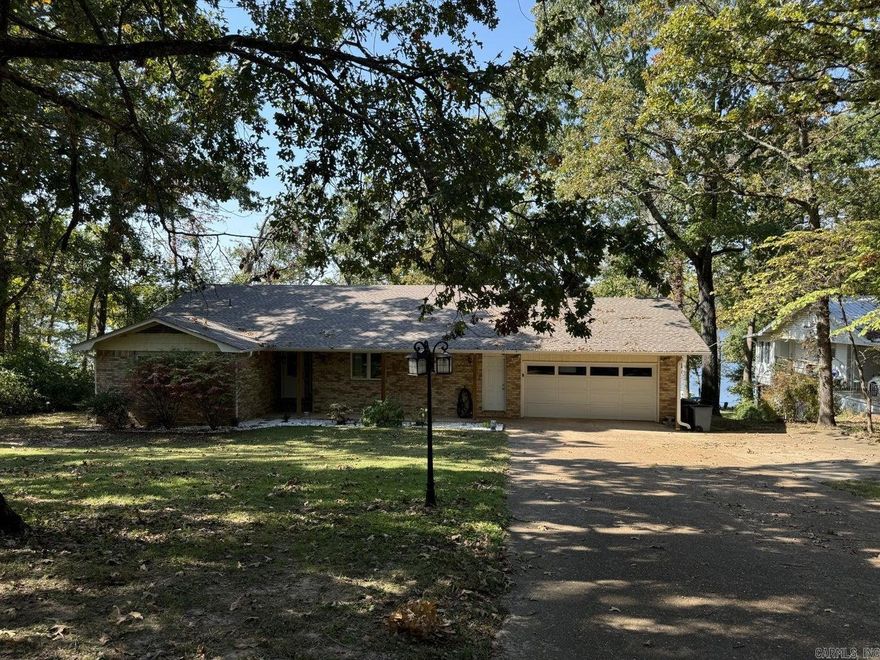 Currently a profitable AirBnB, this Crown Lake front home features 3 Bedrooms and 2 Baths. Home features open floor plan with primary bedroom on opposite ends of home. Large kitchen opens onto covered porch with stunning lake views. Main floor living room features a gas fireplace. Walkout basement features game room and electrical closet. New roof and dock added in 2022. Make it your new lake home or your next investment property! The link to the AirBnB is https://www.vrbo.com/2589105