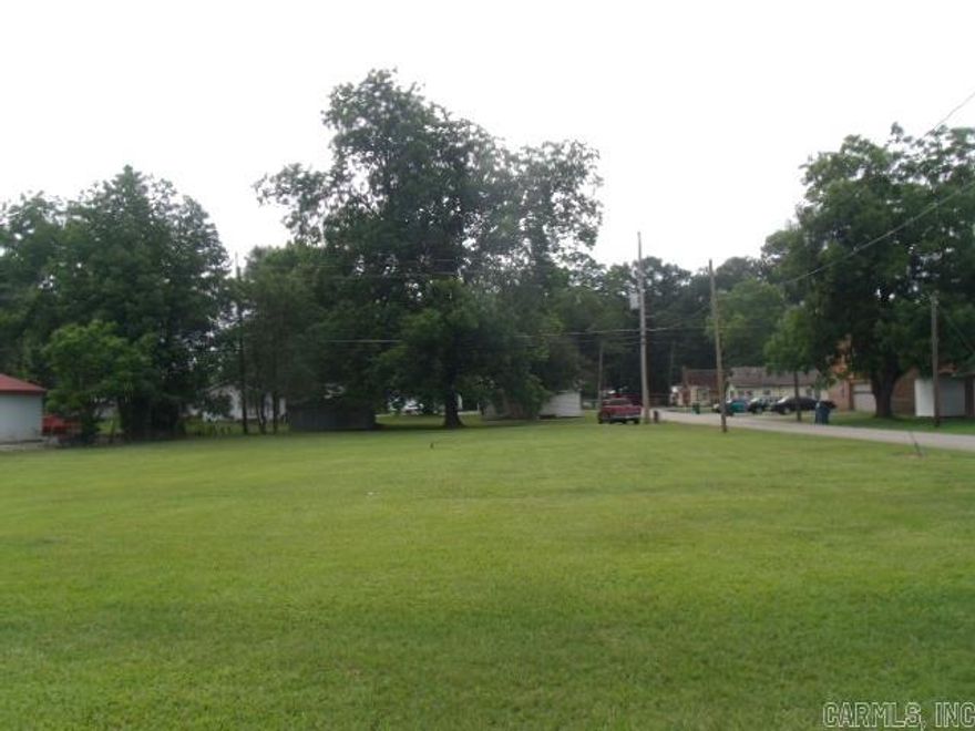 Commerical Corner Lot Located on Main Street.   Lot has Hwy frontage, in downtown Nashville and on a corner lot.   The investment possibilities are endless. Call today and take a look at this lot.  City has recently installed new sidewalks that adjoins this property, adding to the curb appeal.