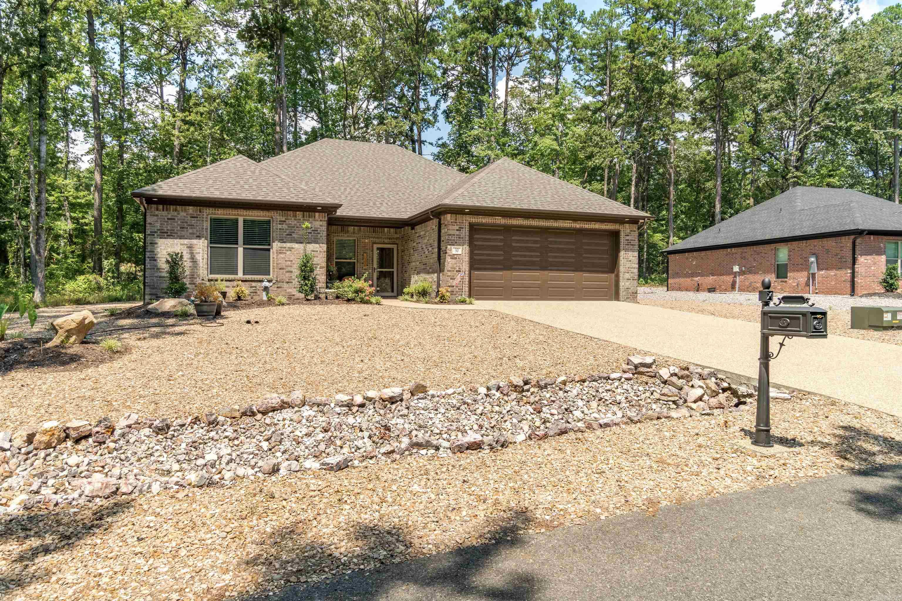 Quality built by Renaissance in 2023, all brick home located in the Sacedon neighborhood. Magnolia floor plan features 3 bedrooms; 2 bathrooms; kitchen with white quartz countertops; GE stainless steel appliances; walk-in pantry; luxury vinyl plank flooring; LED fireplace with heater and tile surround; covered back patio; window blinds; and 2 car garage. Energy efficient home with foam wall insulation; programmable thermostat; recirculating hot water; and low E window package. Owner additions include front storm door; two outdoor ceiling fans; and extended tiled patio in back. Refrigerator; washer; dryer and garage storage shelves convey with purchase. Some furnishings available for sale separately. See Agent Remarks for additional details.