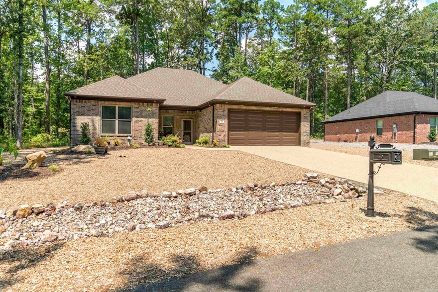 Quality built by Renaissance in 2023, all brick home located in the Sacedon neighborhood. Magnolia floor plan features 3 bedrooms; 2 bathrooms; kitchen with white quartz countertops; GE stainless steel appliances; walk-in pantry; luxury vinyl plank flooring; LED fireplace with heater and tile surround; covered back patio; window blinds; and 2 car garage.   Energy efficient home with foam wall insulation; programmable thermostat; recirculating hot water; and low E window package. Owner additions include front storm door; two outdoor ceiling fans; and extended tiled patio in back.  Refrigerator; washer; dryer and garage storage shelves convey with purchase.  Some furnishings available for sale separately.  See Agent Remarks for additional details.
