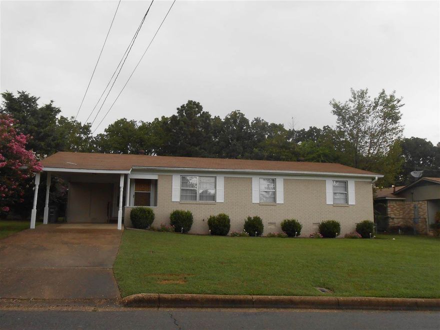 3 b/2 bath all brick sunroom, move in ready, large fenced backyard, storage building, eat-in-kit/ breakfast bar. hardwoods and tile, located right off central, near bypass, shopping, and hospital. yard has flowering and trees, stone pad for outside table.