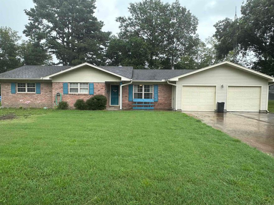 Welcome to this charming 3 bedroom 2 bathroom home situated on a spacious corner lot, offering ample outdoor space and privacy.  The home features a two car garage for convenient parking and storage, along with a separate shop located behind the house, perfect for hobbies or additional workspace.  The newly installed french back doors allow for an abundance of natural light and provide easy access to the backyard.  This home is move in ready and ready for your personal touch.