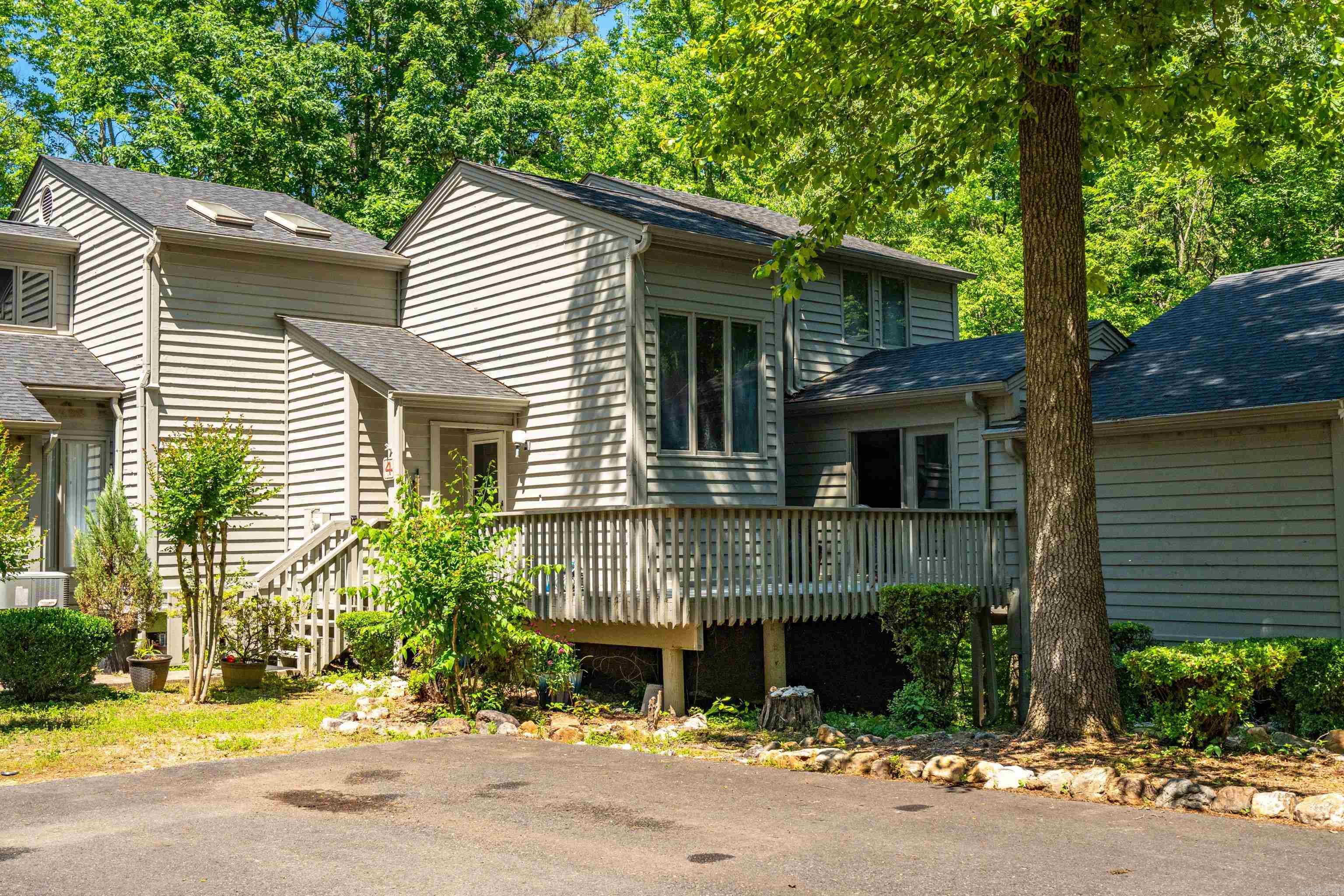 Lake Ouachita Getaway!! Enjoy serene Lake Ouachita living in this beautifully maintained 3-story, 4-bedroom, 3-bath condo in the sought-after, gated, Silver Point Subdivision including a community pool, 2 walking paths to the lake, and optional garage for added convenience. You'll experience stunning views of Lake Ouachita for 8 months of the year with 2,570 sq ft of living space and decks on every level. Recent updates include Professionally painted inside and out, new flooring (2020), a new roof (2023), and upgraded French doors and sliders (2018). Whether you're an outdoor enthusiast or simply seeking a quiet lake retreat, this home offers it allājust 1/2 a mile to Twin Creek Recreation Area with a public boat ramp, swimming beach, covered fishing dock, and picnic area. Move-in ready and perfectly positioned for year-round lake life enjoyment! POA Fees take care of Roof, Exterior Paint, Pool, and Grounds including individual Decks. This would make a fabulous home or vacation home - it's conveniently located *3.5mi to Mountain Harbor; 2mi to Shangri-La; 1mi to Lake Ouachita Shores