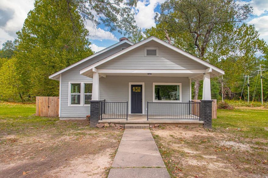 Enjoy the tranquility of country living while still being close to town in this charming 2-bedroom, 1-bath home situated on a peaceful 2 acres. This updated home features a cozy living room with a wood-burning fireplace. The kitchen boasts granite countertops, a breakfast bar, and a dining area, offering both style and functionality. This home is perfect for those seeking privacy and a comfortable, modernized space!