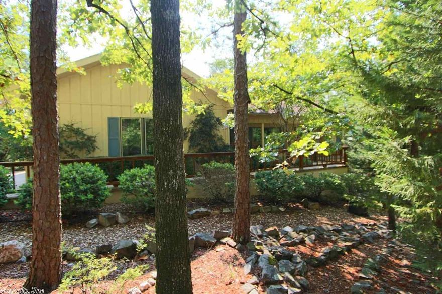 Conveniently located on Eastern side of Village, this home is just off the beaten path in a private setting.  One owner single level home has been well maintained both inside and out.  Heat pump (2008); Roof (2009); two water heaters (1 replaced 2006).  Features include volume ceilings; hardwood floors; walk in shower and dual sinks in master bath; covered deck and front porch; and over sized 3 car garage.  Home has been wired for generator.