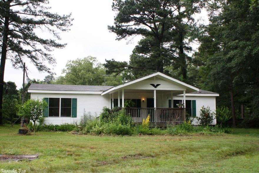 Spacious country living with this 3 bedroom 2 bath mobile home on 1 acre. Large portion of the property is flat and ready for your shop to built. Great visibility from AR-111 for a home based business. This home includes central heat and air, open floor plan, large living area, new windows, and plenty of storage. It has a 16' x 16' covered from porch PERFECT for relaxing and enjoying the peace and quiet. Only minutes back to I-30 and Little Rock. This home is in need of some TLC (flooring, updates, etc).